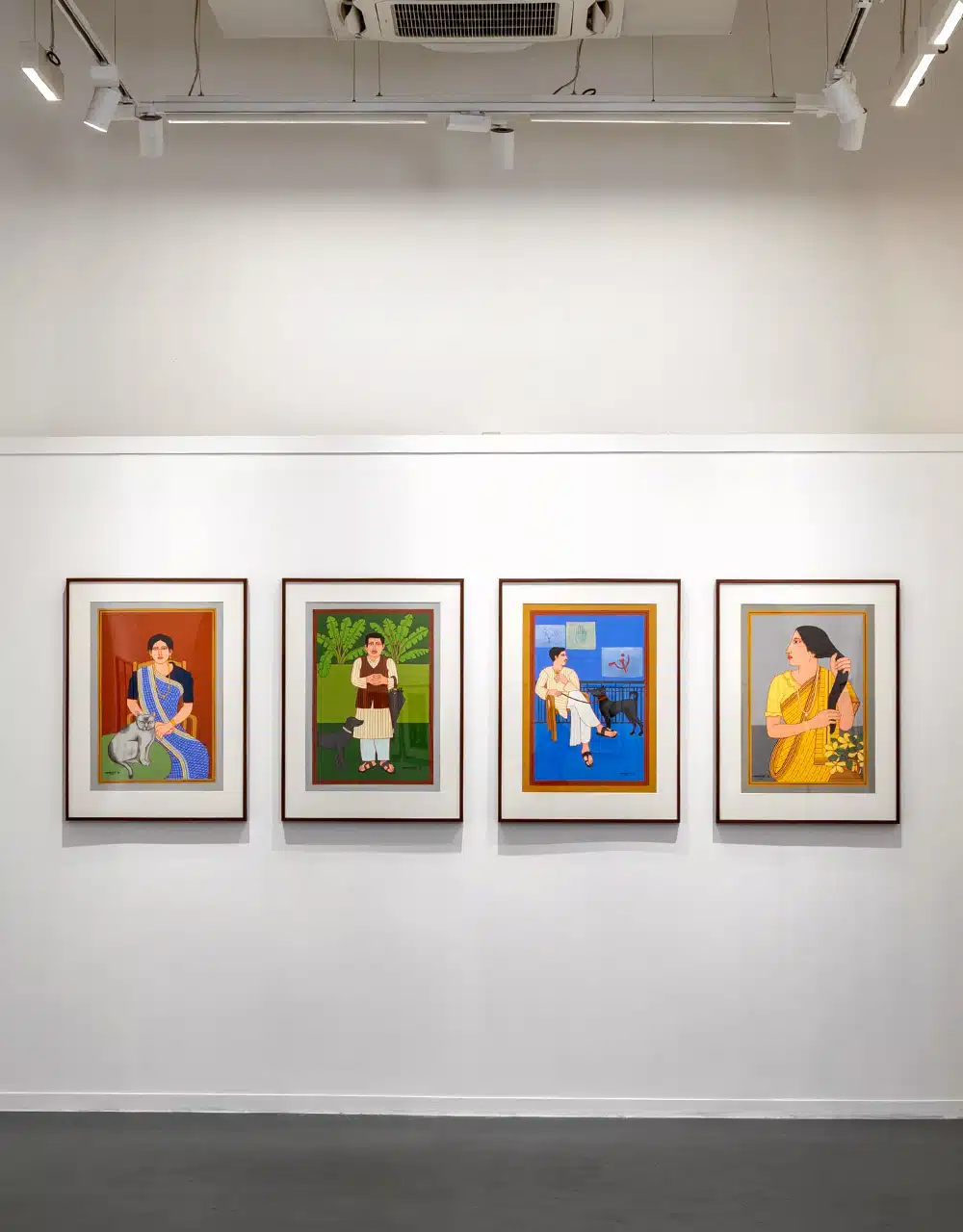 A master of the figurative genre, Shaw's portraits of the Bengali bhadralok use bold colours to tell everyday stories. Installation view of Lalu Prasad Shaw's Early and Recent Paintings at Bikaner House. Courtesy of Gallery Art Exposure