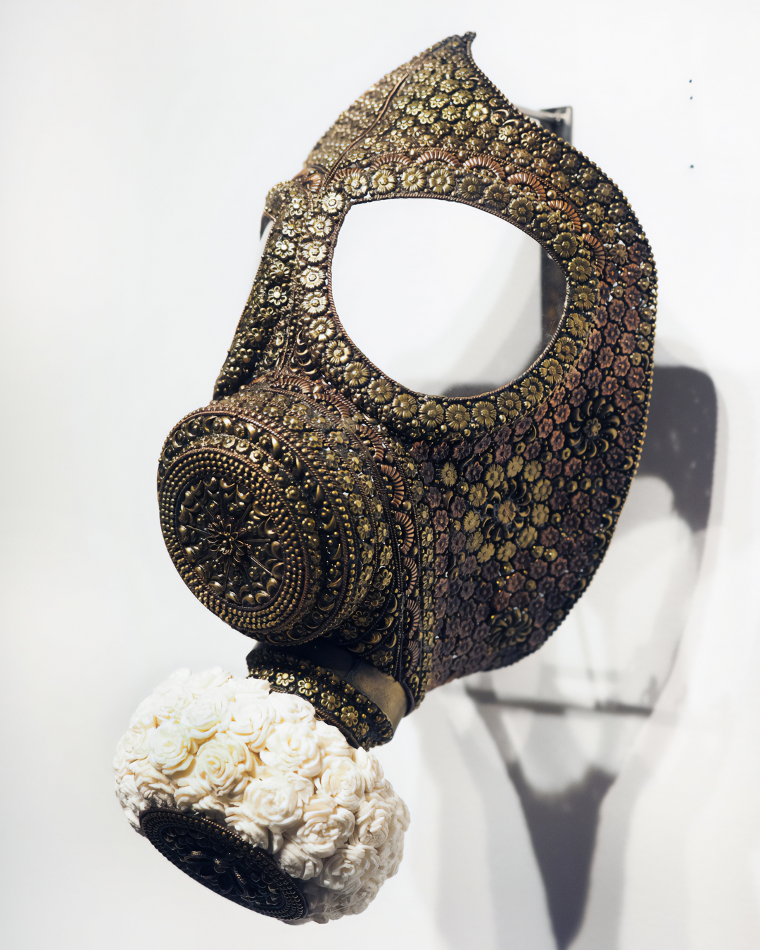 Promotesh Das Pulak. Gas Mask for the Rich and Famous, 2019. Shola flowers, resin and metal. Courtesy of Aicon Contemporary